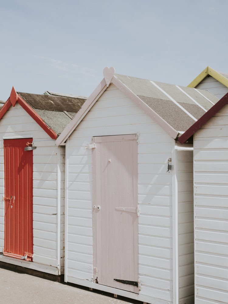 Pastel beach huts by the beach